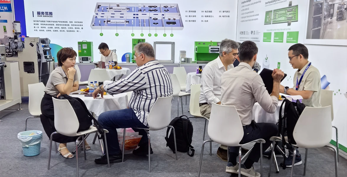 TOB NEW ENERGY CEO Dr. Dany Huang and Marketing Director Amy Wang in technical discussion with international clients about solid state battery equipment at CIBF2026 TOB NEW ENERGY CEO Dr. Dany Huang and Marketing Director Amy Wang in technical discussion with international clients about solid-state battery equipment at CIBF2026